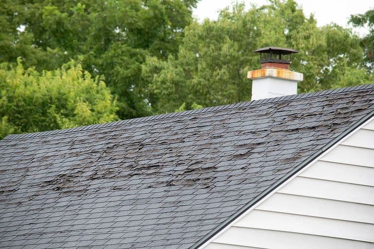 66e31c64624223863c2c5665_6668f4d33ee3c9456b6355d2_missing-shingles-on-roof.jpeg