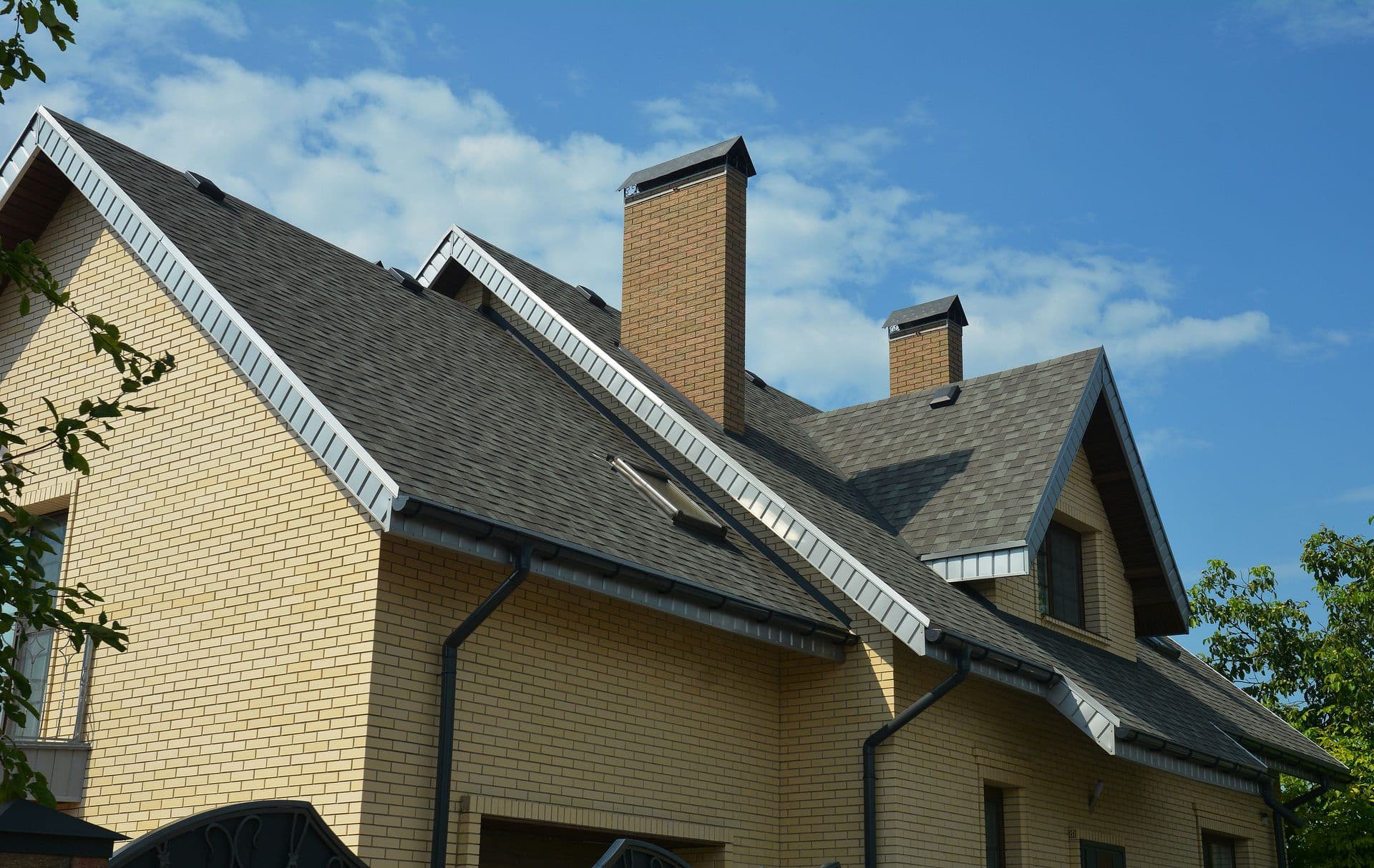 bigstock-An-Asphalt-Shingled-Roof-With--435755486.jpg
