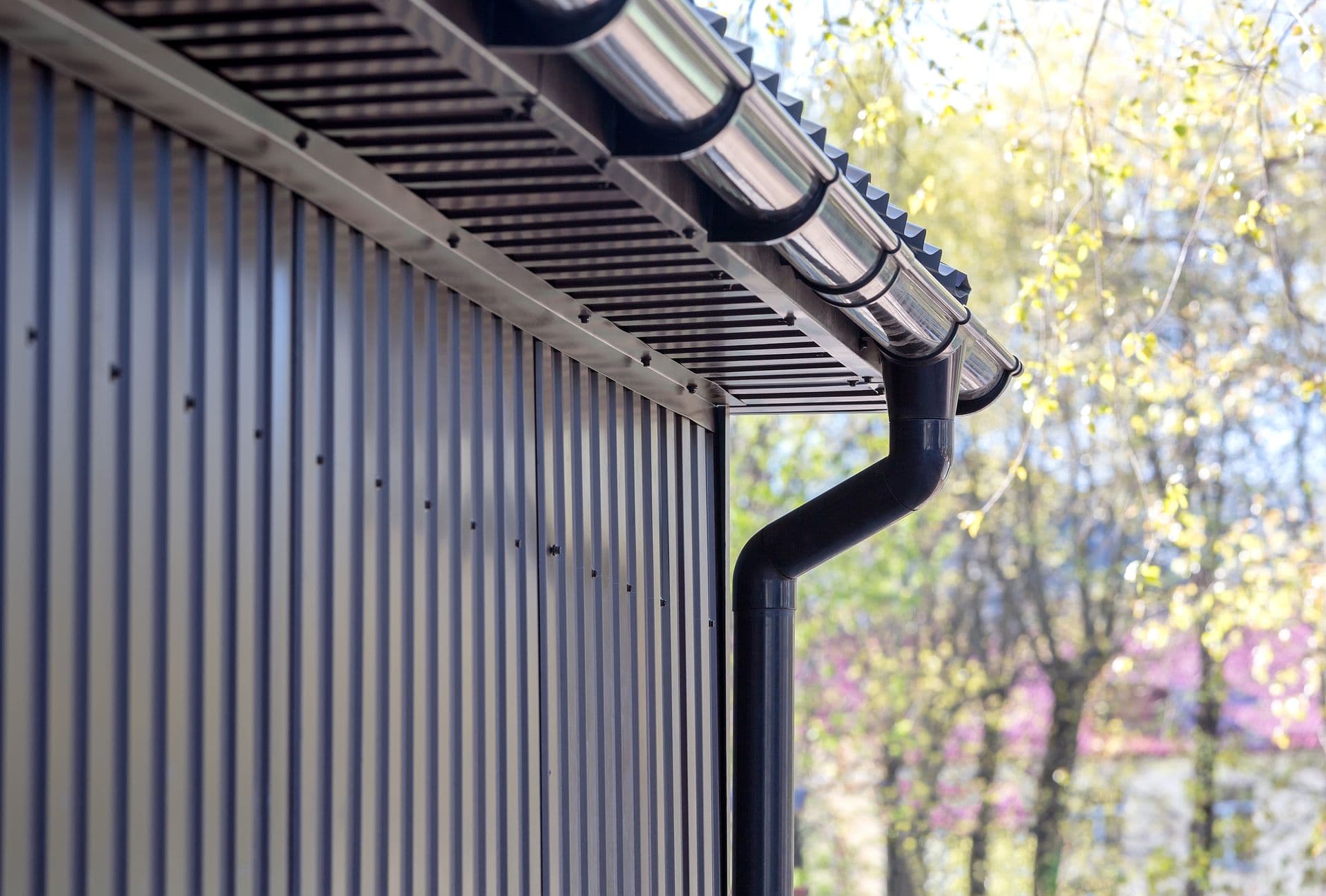 bigstock-Brown-Plastic-Downspout-125908187.jpg